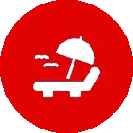 A red circle with an umbrella and chair in it.